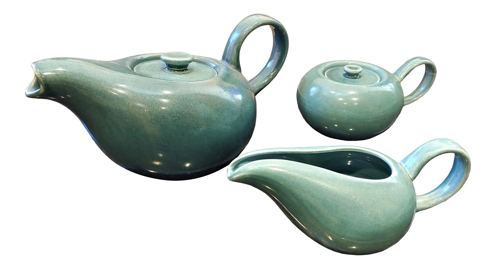 Mid-Century Modern Russel Wright Tea Set - 3 Pieces: Mid-century lifestyle influencer, Russel Wright believed, 'The table was the center of the home.' Now with 'Mid-Mod' all the rage again, Russel Wright's American Modern Collection of dinnerware and se