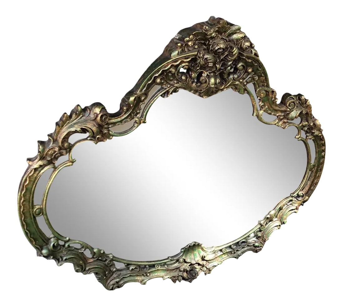 Mid 20th Century Rococo French Gold Wall Mirror: Rococo French Gold Gold Mirror Highly detail mirror with scroll work Floral and Shell design Is about 4 inches thick On sides there is damage but I see minor age wear only in front This is a