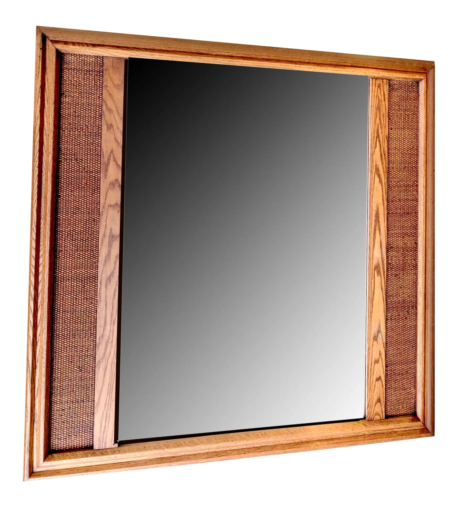 Monumental Mid-Century Modern Russel White for Conant Ball Solid Maple Framed Wall Mirror: Maple wood framed wall mirror featuring flanking woven cane panels. Panels can be displayed as flanking right and left or upper and lower. There is no makers mark other than number code for