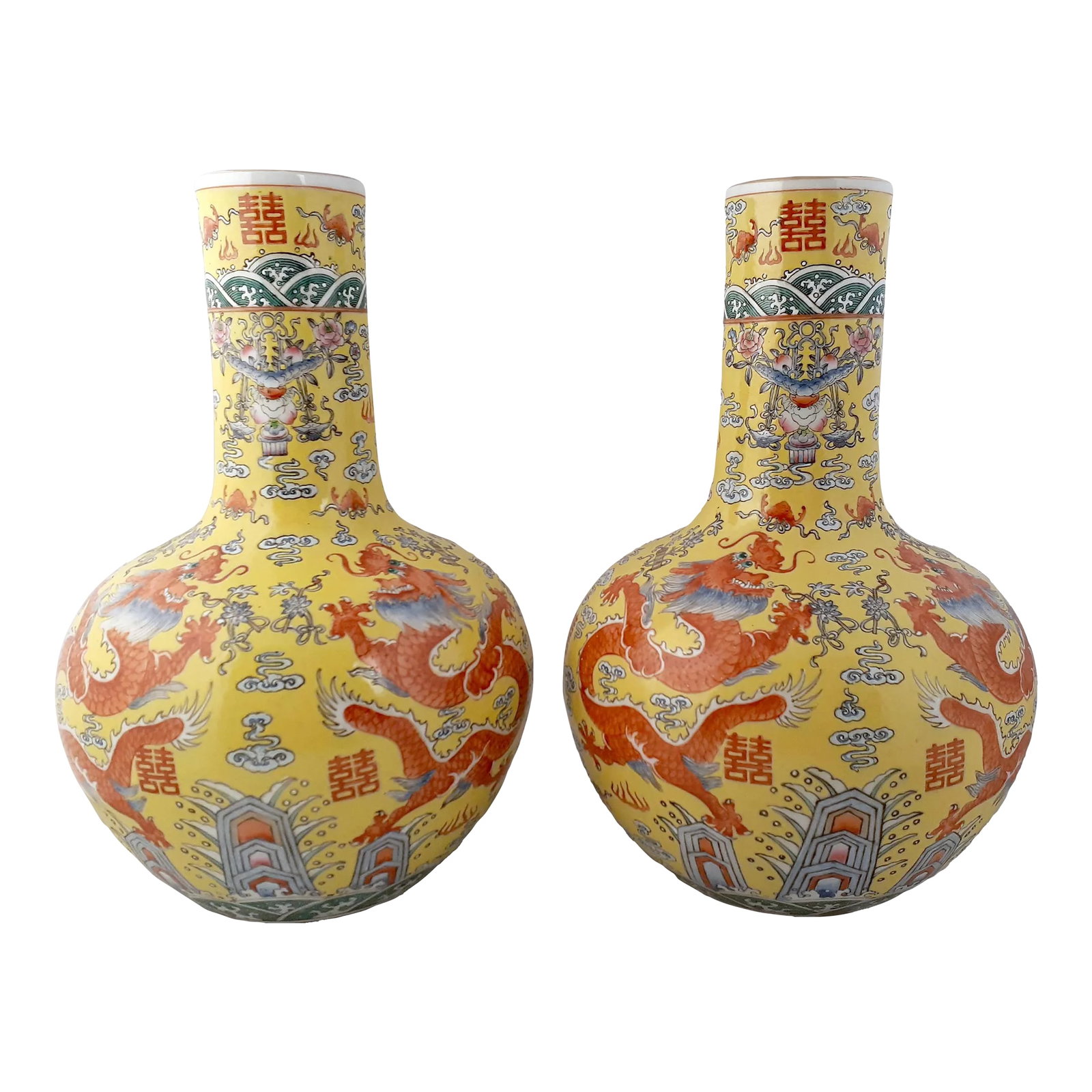 Early 20th Century Pair of Chinese Porcelain Tianqiuping Dragon Vases: A pair of Chinese porcelain tianqiuping dragon vases, each with an imperial yellow glazed exterior, white glazed interior and inset base, gilt lip. On the front and back of the body of the vase there 