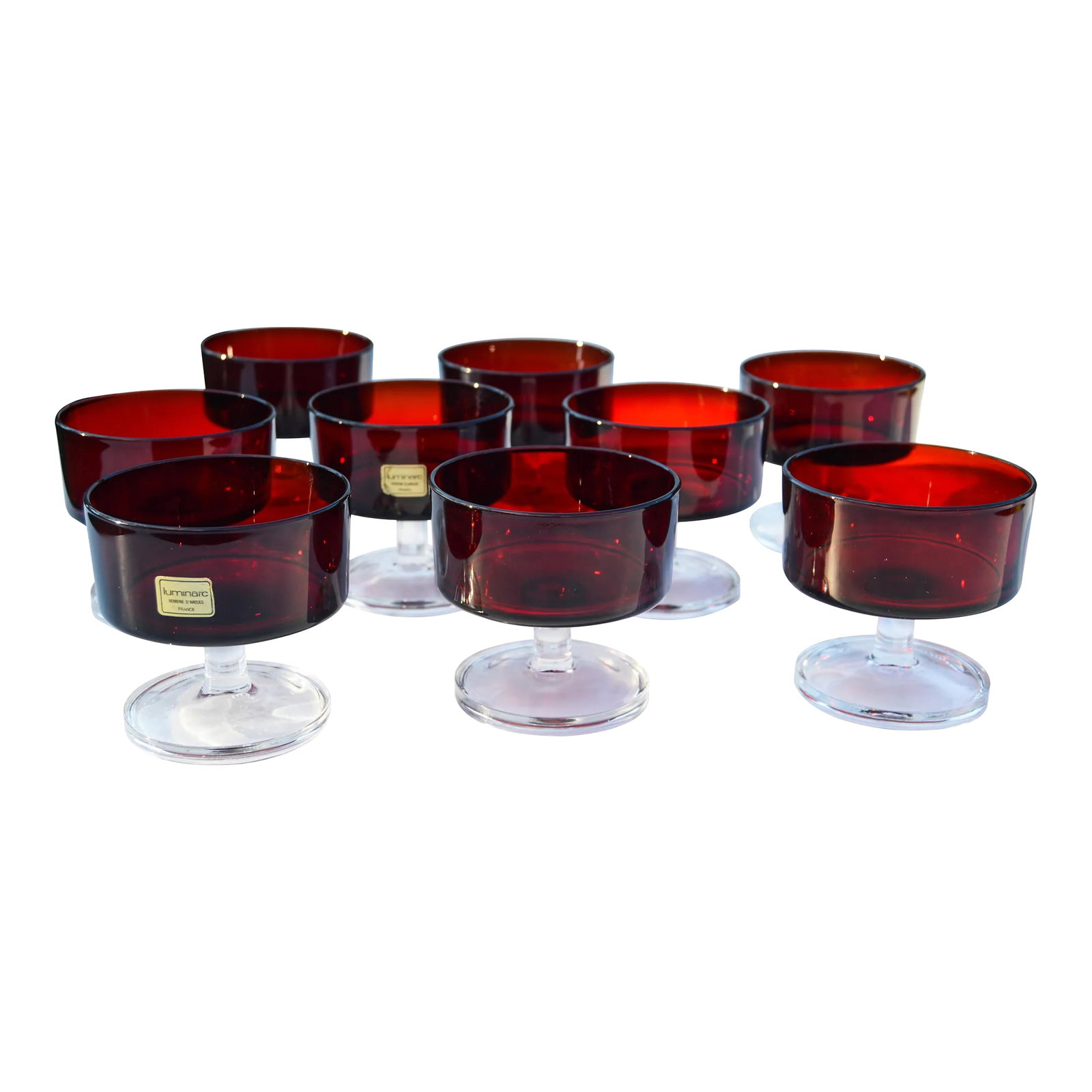 Vintage French Red Crystal Glasses- Set of 9: Set of nine ornate vintage French crystal glasses in ruby-red with clear stems. Marked on undersides. This beautiful accent ships within 1-2 business days from purchase, and to be received within 2-4 