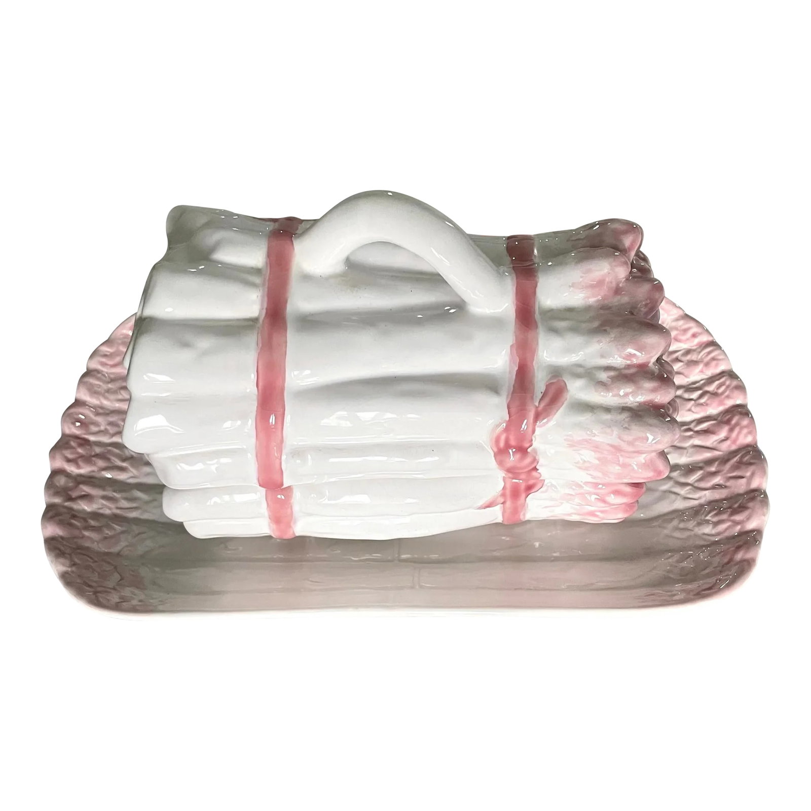 1960s Majolica Asparagus Tureen With Dish Set- 2 Pieces: This beautiful tureen is all in white with soft pink details. The tureen is 7.25" x4.25" and the dish is 12"x 6.5". Ideal pairing with creamware for any dining table. Condition: Alterations: Original