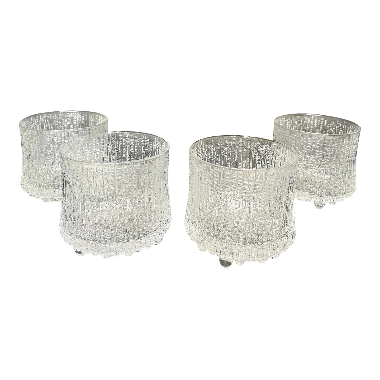 1960s Ultima Thule Tapio Wirkkala for Iittala Finland Cocktail Glasses - Set of 4: Brutalist modernism in glass form, this set of glasses will bring beauty and elegance to any modern bar or table. Ultima Thule glasses are part of Iittala's iconic glassware line created in the