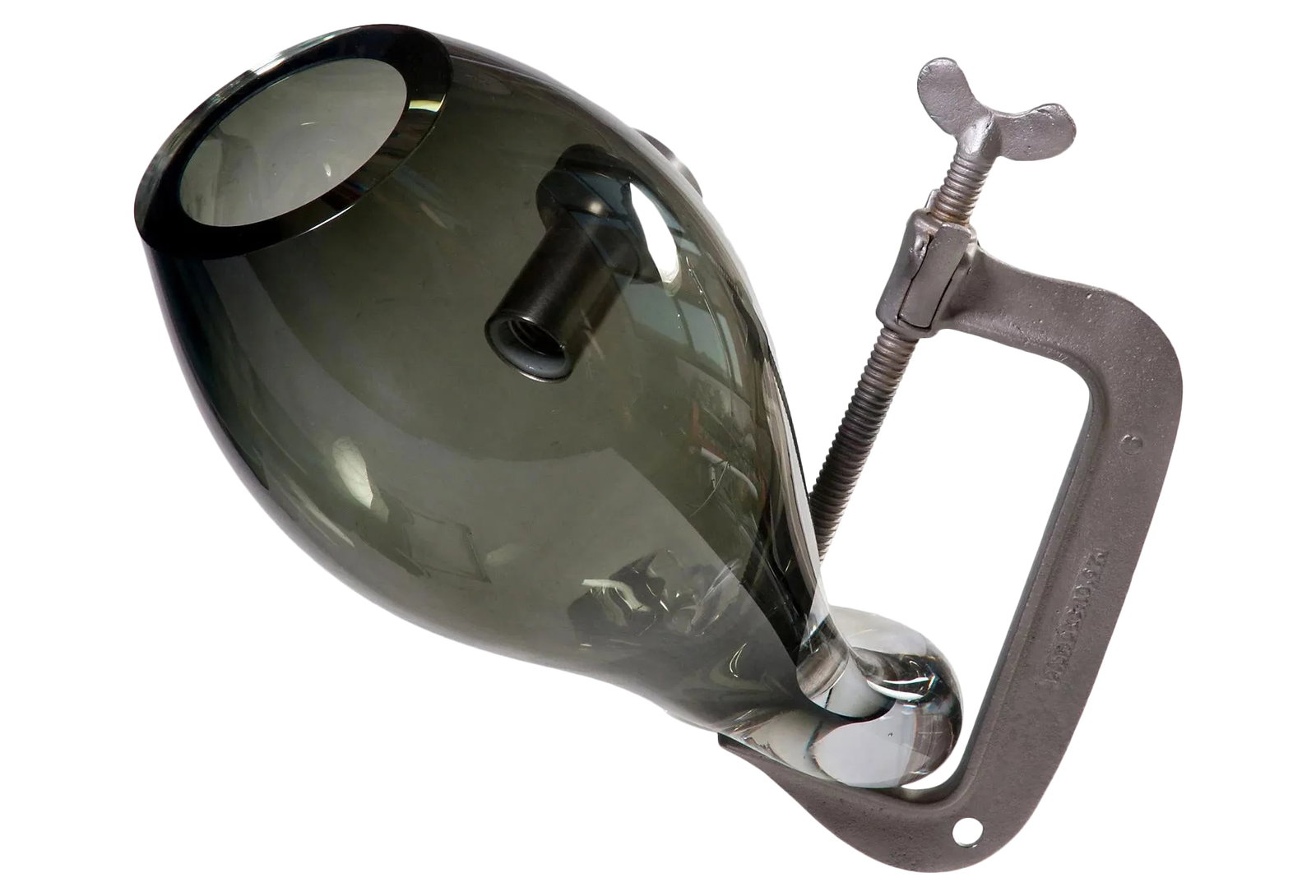 Industrial Clamp Light Pendant: An industrial pendant with a "C" clamp and blown glass. A wonderful piece for your home. Note, the canopy was been removed and is rewired. A plug is now installed with a cord length of 31" and a new c