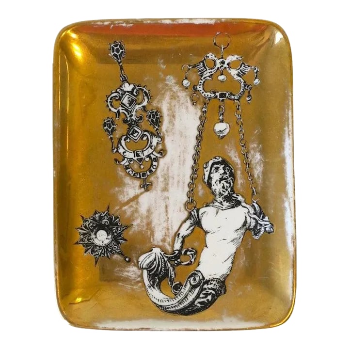 Fornasetti Black and Gold Catchall Jewelry Dish Tray: An Italian black and gold porcelain jewelry tray or dish by designer by Piero Fornasetti, circa mid-20th century, 1960s, Italy. A great piece for any desk, dresser, vanity, cocktail table, etc. as a