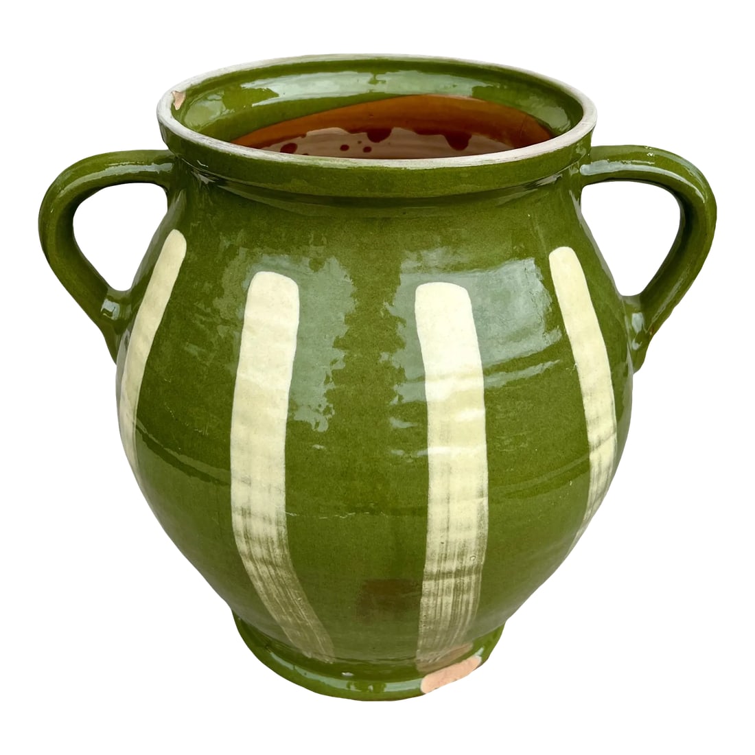 Late 20th Century Green Glazed Earthenware Vessel: Beautiful in both its shape and decoration, this vintage glazed earthenware vessel is distinguished by its two handled design, playful yellow-hued vertical stripes, and striking green glaze.