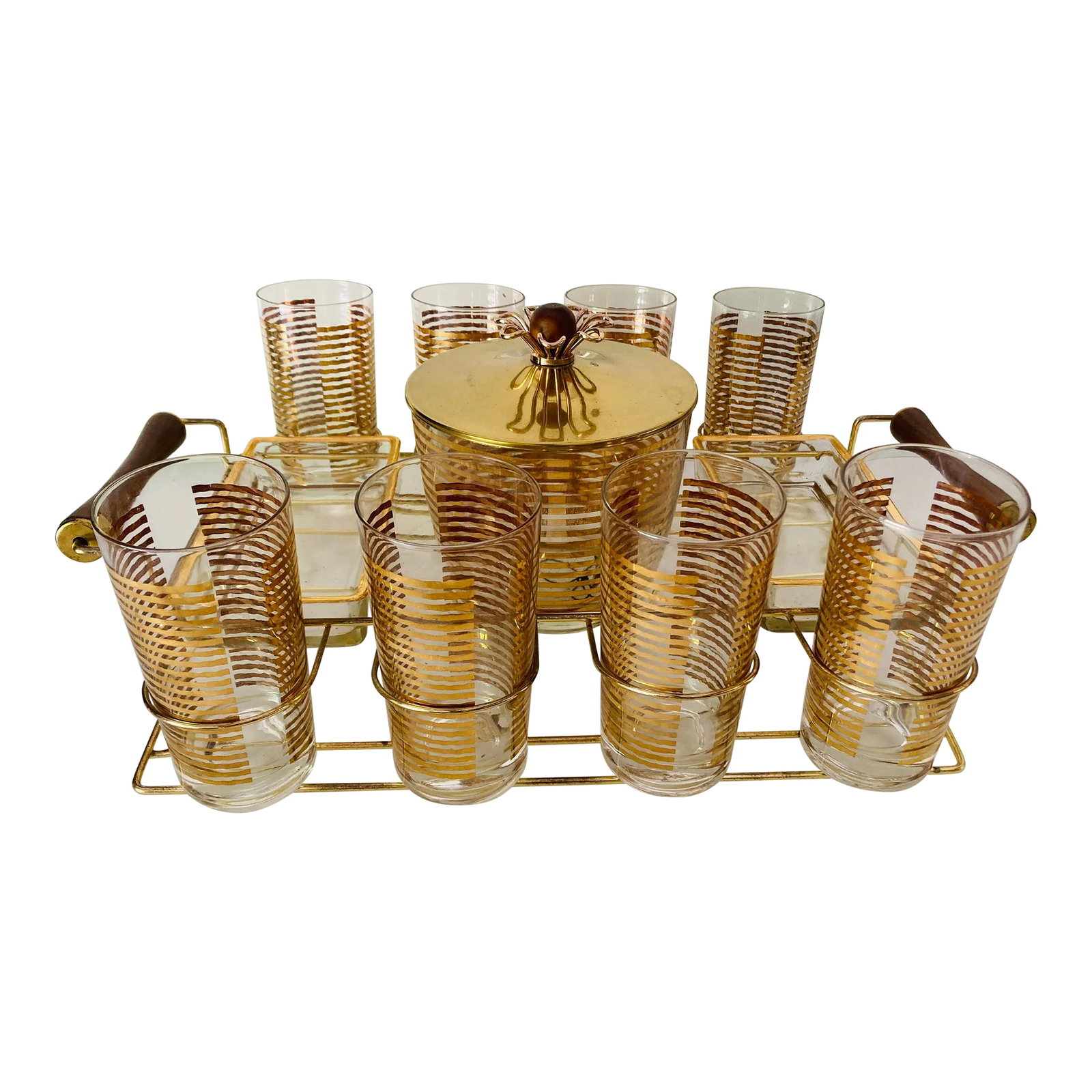 Midcentury Colony Glass Company Bar Glasses Set: Midcentury 12 pieces set includes 8 Glasses each glasses 5.5"H X 2.75"D , Caddy(Tray) 2 Glass Condiments , Ice Bucket with llid. 18.25 X 13.0 X 7.5h, Makers mark reads " Colony Glass Company" Unused a