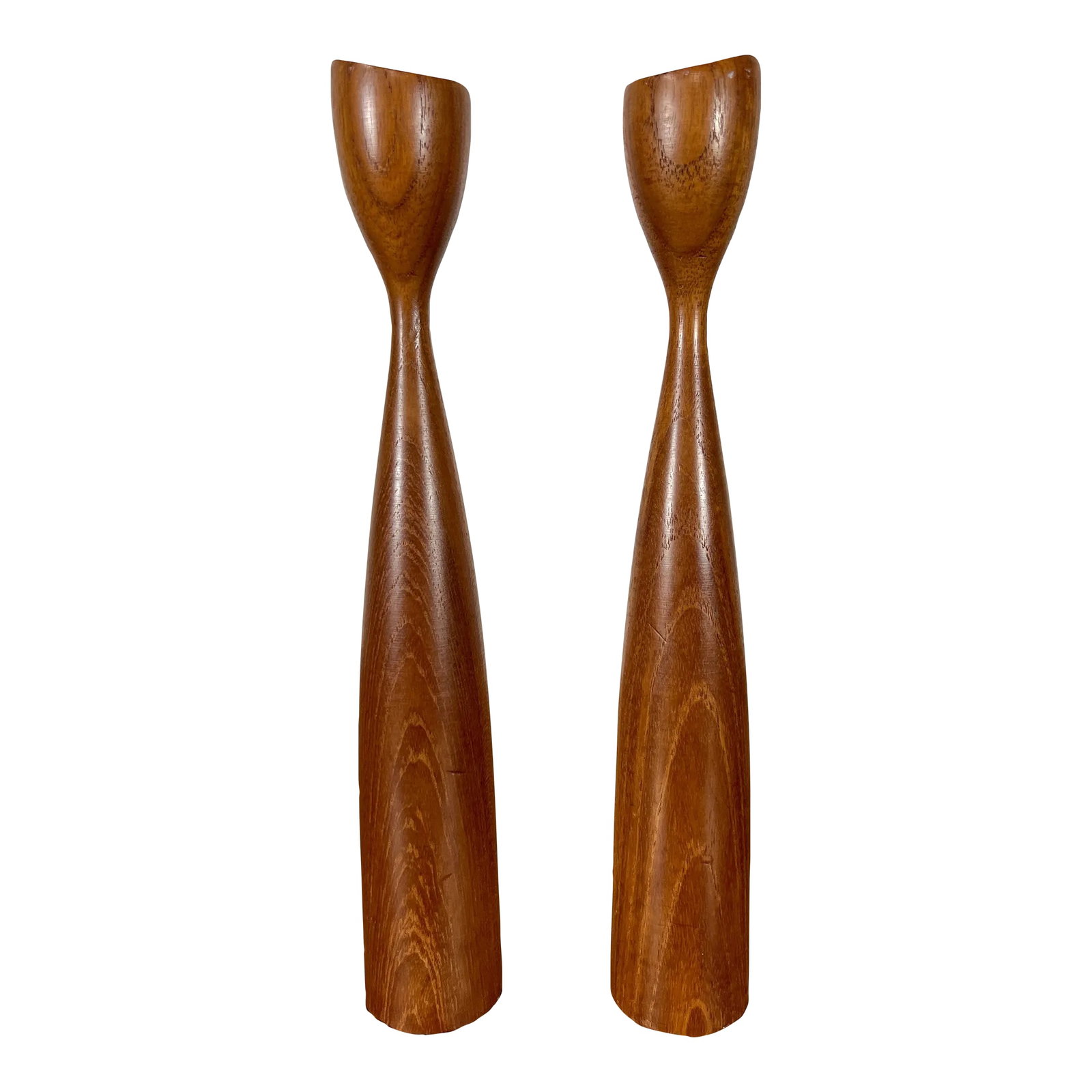 Danish Modern Candle Holders: Pair of vintage Danish Modern candlesticks with asymmetric tops. Lathe turned from solid teak! Condition: Alterations: Original Condition Unaltered Imperfections: Some Imperfections Condition Notes: G