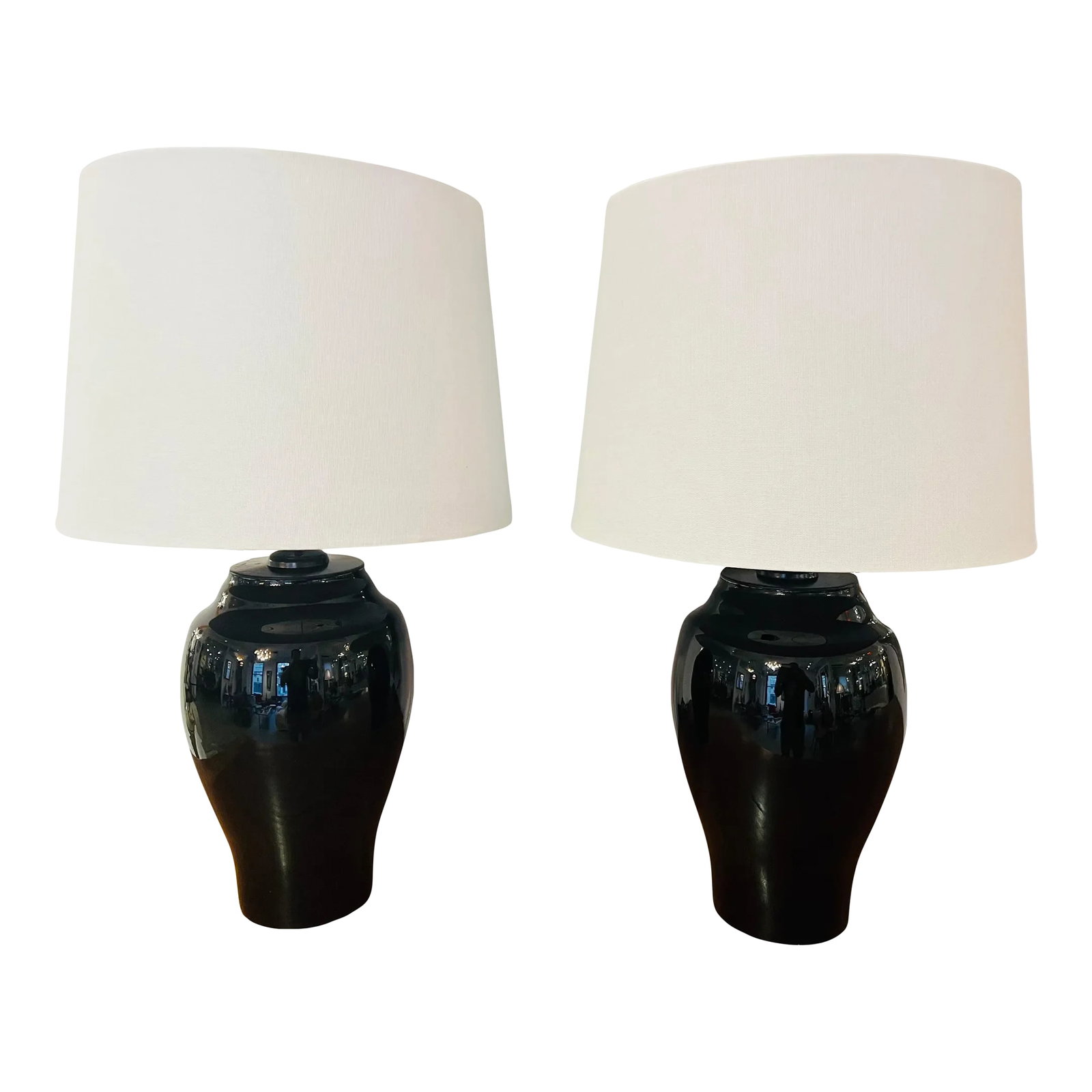 Austrian Moser Crystal 1970 Table Lamps - A Pair: Pair of 1970s Austrian black urn crystal table lamps by famed maker, Moser. Rewired with polished double cluster brass sockets and brown cloth cords. Voltage: 110-150v Condition: Alterations: