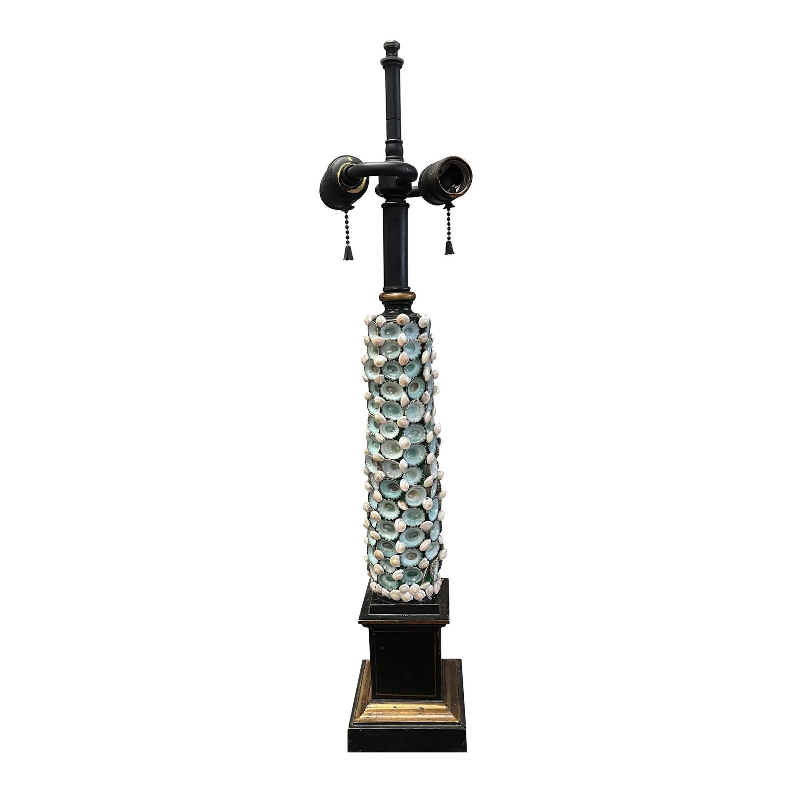 Early 20th Century French Neoclassical Painted and Shell Encrusted Lamp: A very solid well made cast metal French table lamp painted black and gold in a neo classical empire design. The main part of the lamp has at one time been encrusted in celadon green sea shells. I bel