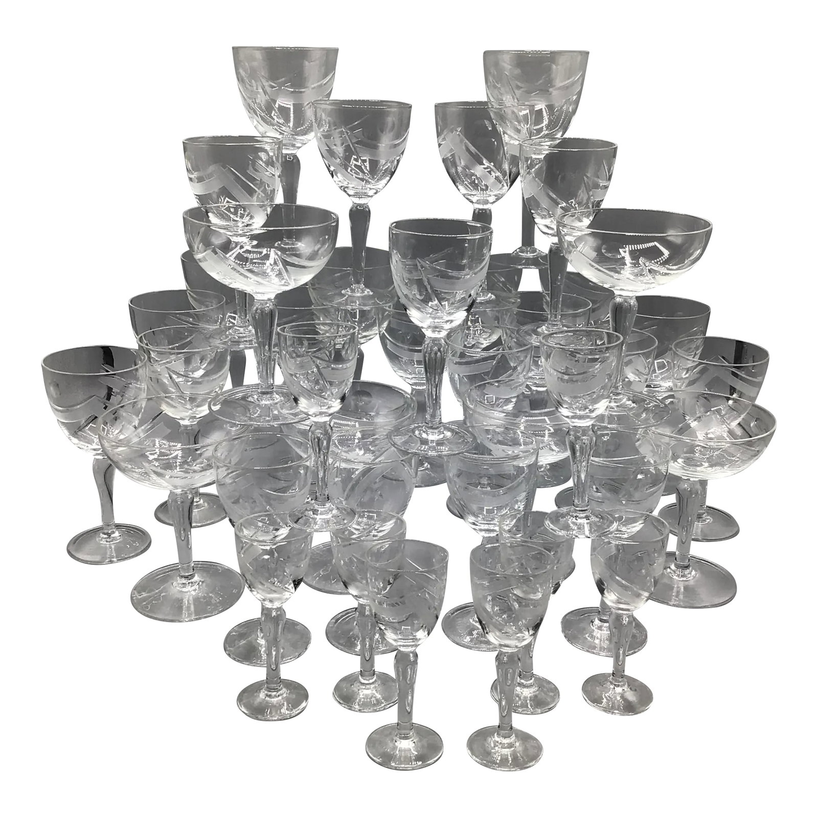 Cut Crystal European Abstract Line and Bubble Stemware-Set of 39: From what I can find and because of the odd size measurements it appears that these rare abstract cut crystal glasses are made in Italy, France or Germany. This set of 40 abstract dot and line cut