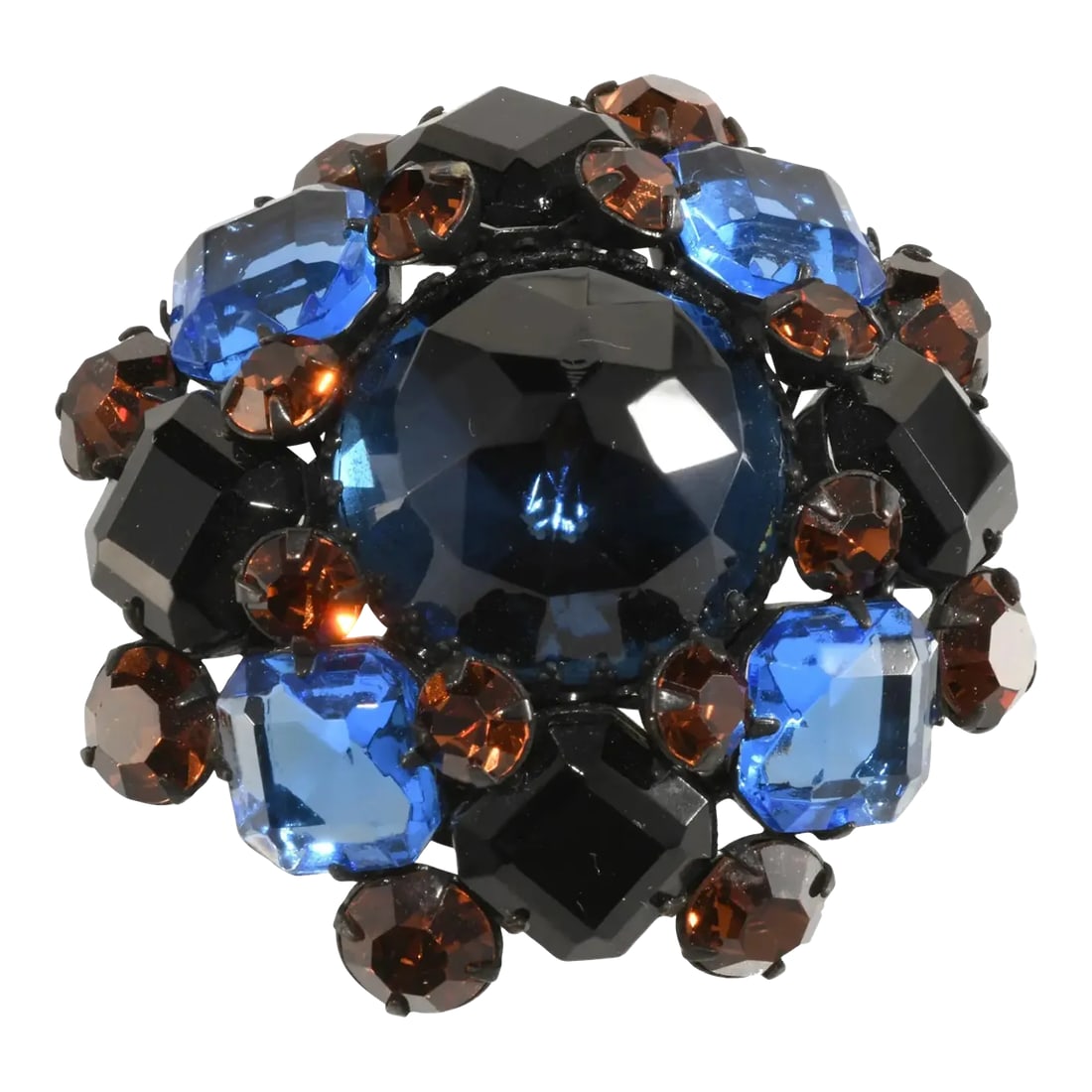 1960s Mimi Di N Vintage Domed Brooch Blue Brown Rhinestones: This is part of Chairish's Costume Jewelry assortment. Amazing domed brooch with large inverted stone in the center in the style of Schreiner. This piece, however, is marked Mimi Di N for Princess