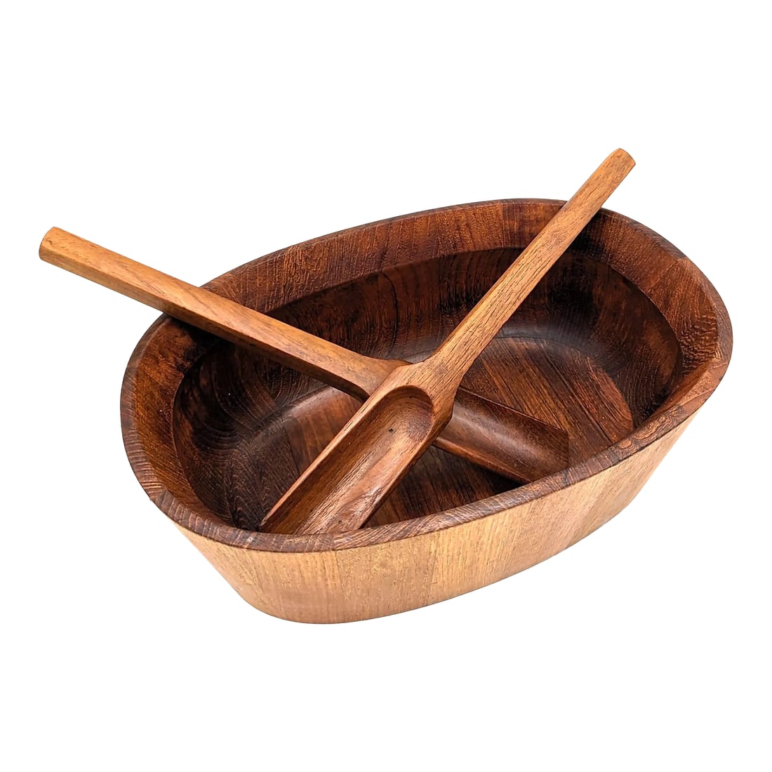 Mid 20th Century Dansk Oval Staved Teak Wood Bowl and Serving Utensils: Made in Langa, Denmark by Richard Nissen's Traevarefabrik workshop some time in the late 1950s, this oval-shaped staved Teak wood bowl and the utensils designed by Jens H Quistgaard that pre-date the