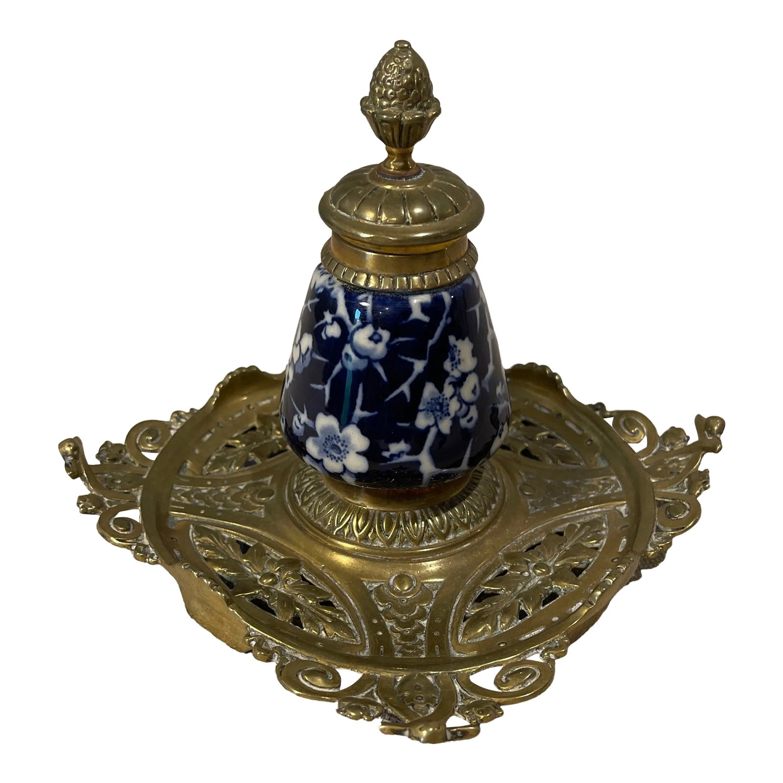 Late 19th Century English Brass & Porcelain Renaissance Revival Inkwell: A fine late 19th Century English embossed brass inkwell encrier in the Renaissance Revival style, Victorian Period, with Diamond registry mark on bottom, pierced decoration, blue and white prunus