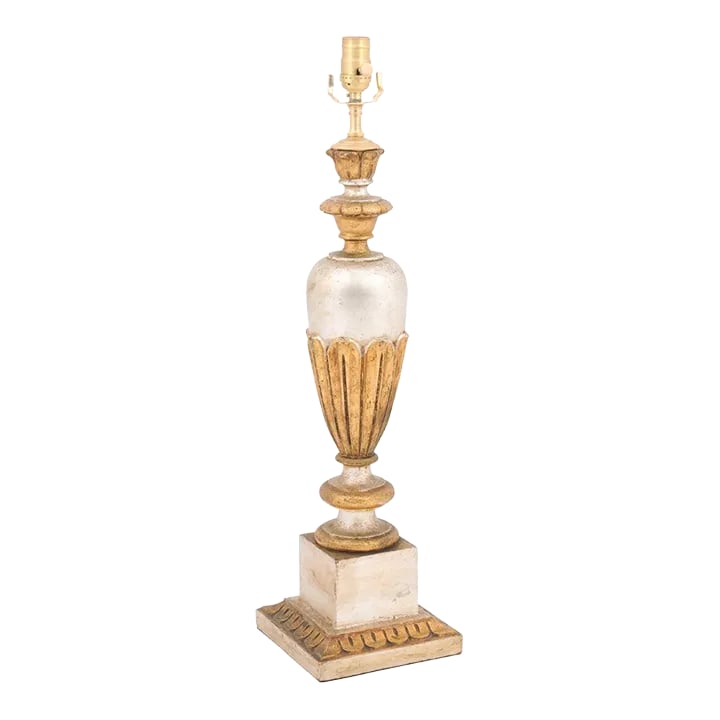 1950s Carved Metal Leaf Over Gesso Lamp, Italy: This carved wooden lamp has been gessoed with a two tone gold + silver leaf applied over it. It has been fully re-wired with solid brushed brass components and a 3-way socket. Condition: Alterations: