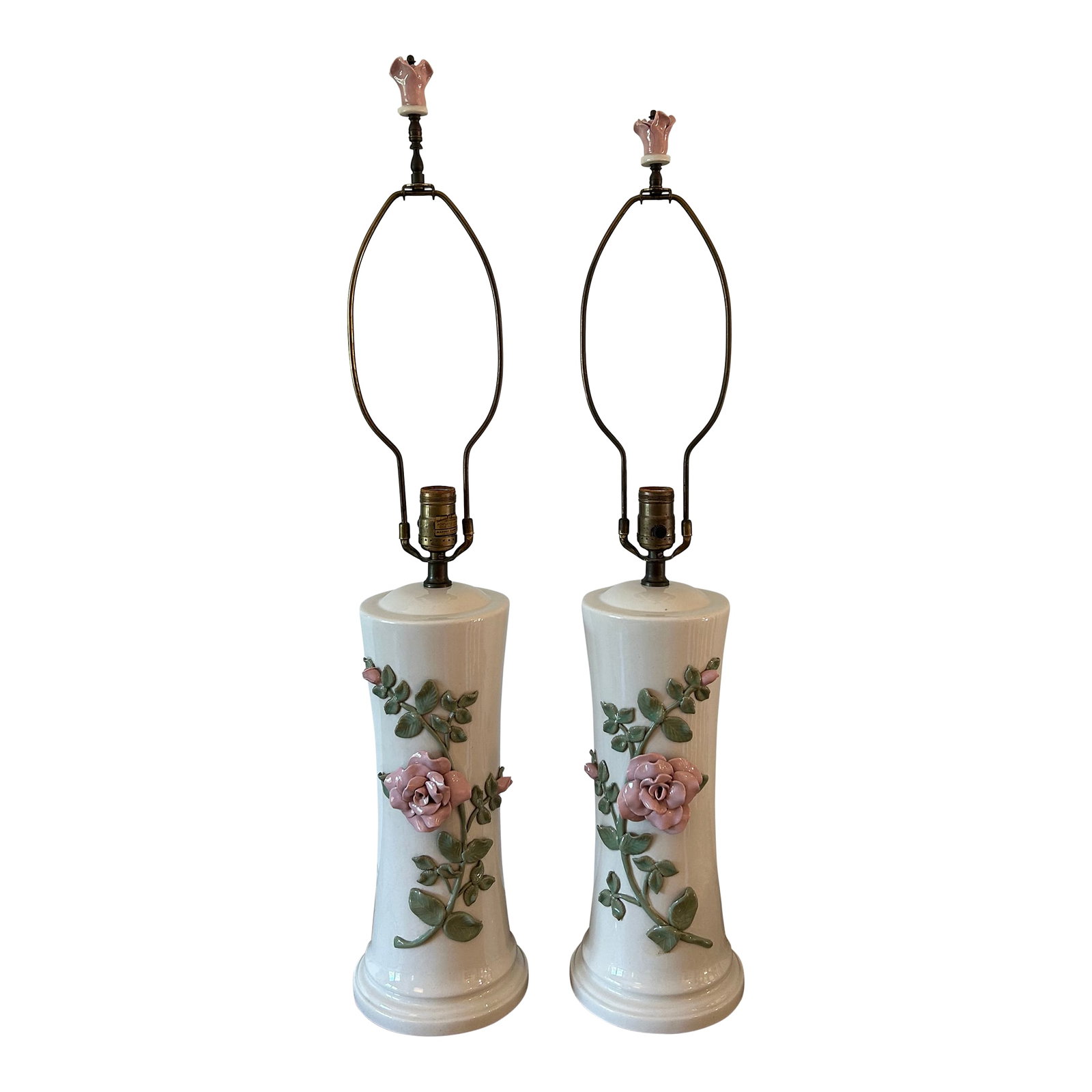 Pair of 1960s Marbro Pink Roses Lamps: Lovely pair of vintage Marbro lamps. Beautiful soft pink porcelain roses and greenery on a soft white backround. Note that the finials are of two different heights. One is 31.5", the other is 33".