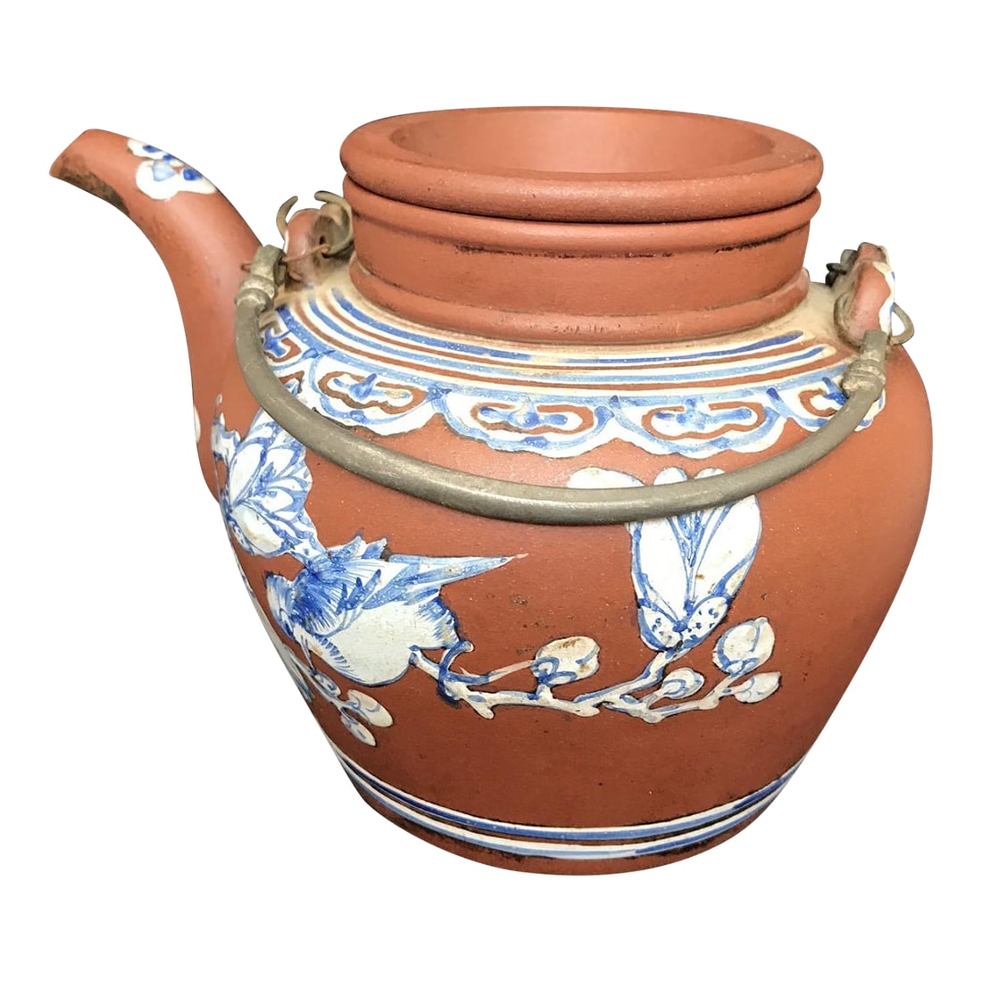 Large Mid 19th Century Antique Yixing Teapot Painted With Blue Enamel Decorations: The terra cotta color teapot with pale and dark blue overglaze enamels is a fine example of the larger teapots used in tea houses and restaurants in the mid 19th century. The teapot has a short neck,