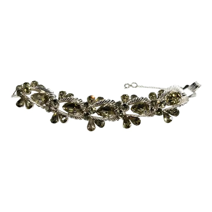 Vintage Silver Tone Bracelet With Gray "Black Diamond" Rhinestones: This is part of Chairish's Costume Jewelry assortment. Amazing vintage bracelet likely dating to the 1960s. It features gray black diamond rhinestones set in silver plated metal with fan shaped findin