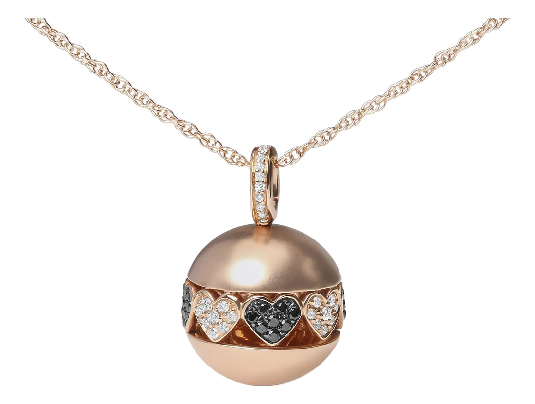 18K Rose Gold 3/8 Cttw Black and White Diamond Ball with Filigree Heart and Cluster Design 18" Penda: Cast in polished 18k rose gold, this ball drop pendant necklace showcases a design that is rich in symbolism. A single row of diamond-encrusted filigree heart silhouettes spread out around the