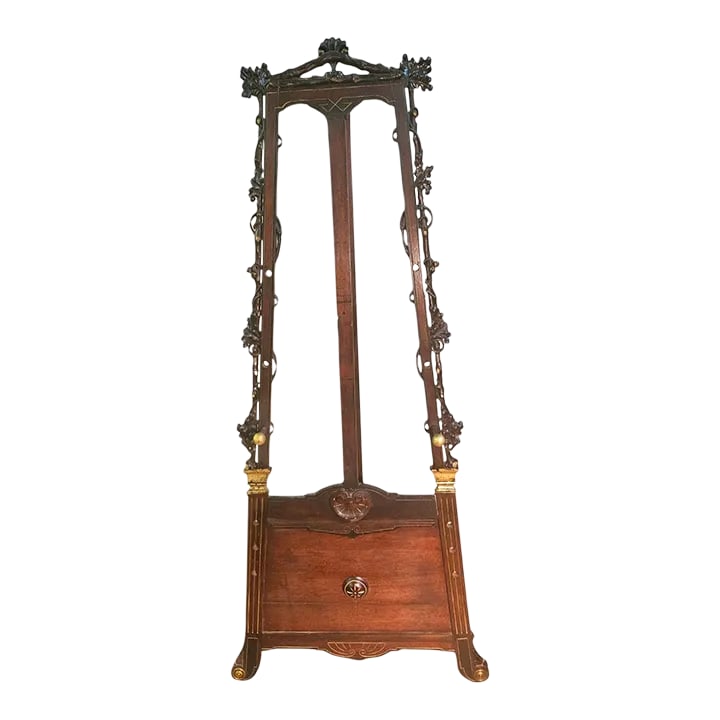 Late 20th Century Egyptian Revival Carved Easel: This beautiful Egyptian Revival is one of a kind. It has carved branches that cascades down & gracefully wraps to showcase your most prized art. Condition: Alterations: Original Condition Unaltered