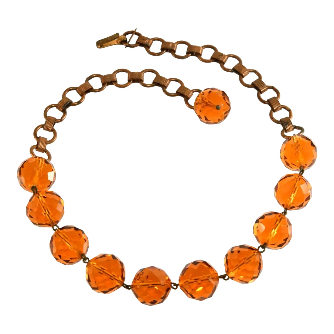 Vintage Regina Fashions Large Amber Glass Beads Necklace: Vintage necklace including large faceted richly-colored amber glass beads with metal chain on each side. Marked Regina Fashions. We believe this vintage piece dates to the 1930s. Measures about 13"