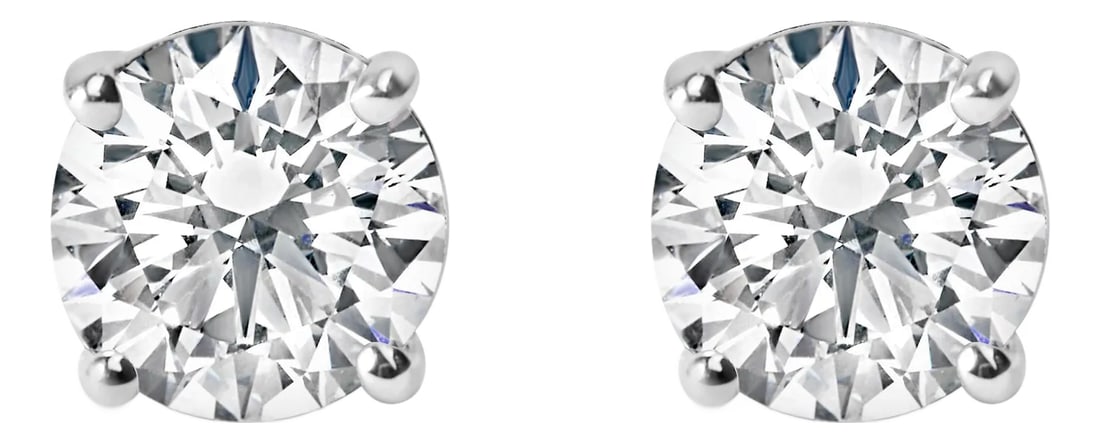 IGI Certified 14K White Gold 1.0 Cttw 4-Prong Set Brilliant Round-Cut Solitaire Diamond Push Back St: Immerse yourself in the elegance of these IGI certified diamond stud earrings, exquisitely crafted from 14K white gold enhanced with rhodium plating for added brilliance and durability. Each earring
