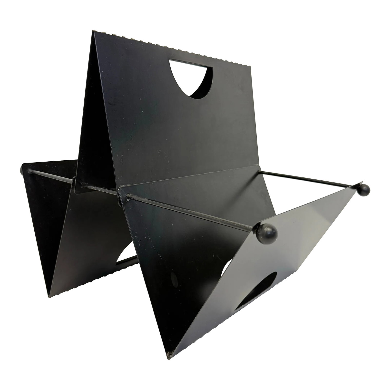 Postmodern Memphis Style Black Metal Magazine Rack, 1980s: Postmodern magazine rack in the Memphis style, circa 1980s Italy. Condition: Alterations: Original Condition Unaltered Imperfections: Some Imperfections Condition Notes: Minor wear to black finish