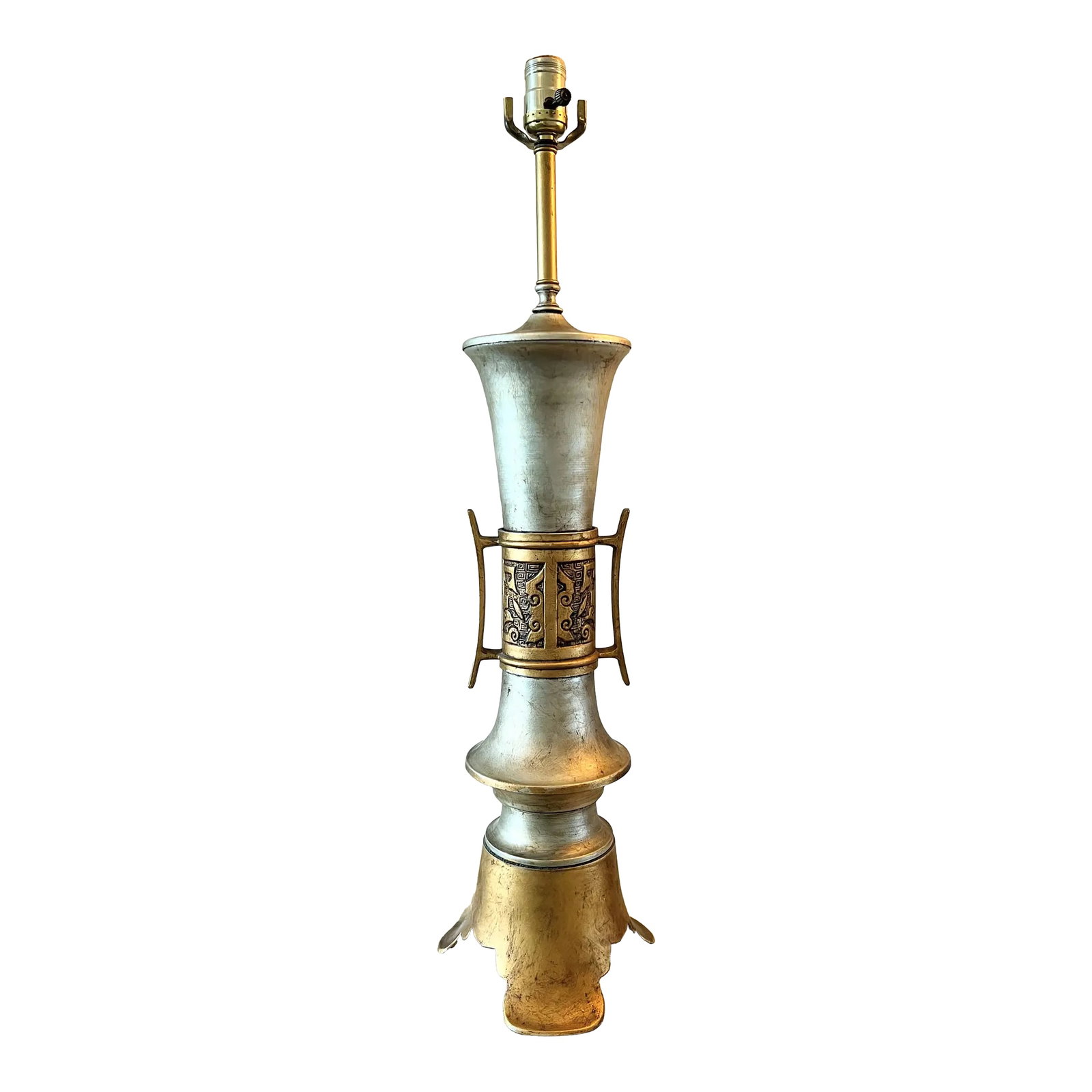 1960s Metal & Brass Chinoiserie Metallic Gold Silver Painted Asian Table Lamp: Stunning two-tone metallic metal chinoiserie lamp from the 60s. Beautiful lines on this lamp. The gold and silver metallic finish gives a subtle and gorgeous glow. The lamp is a classic that could be