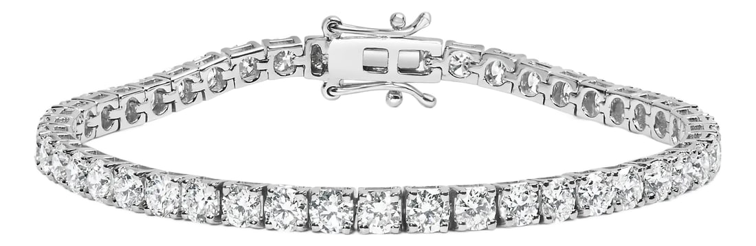 10K White Gold 2.0 Cttw Prong Set Round-Cut 7.25" Classic Diamond Tennis Bracelet: Elevate her attire with the luxe look of this magnificent diamond tennis bracelet. Crafted in cool 10K white gold, this spectacular design features 78 dazzling 0.026 cttw diamonds. Ravishing with 2