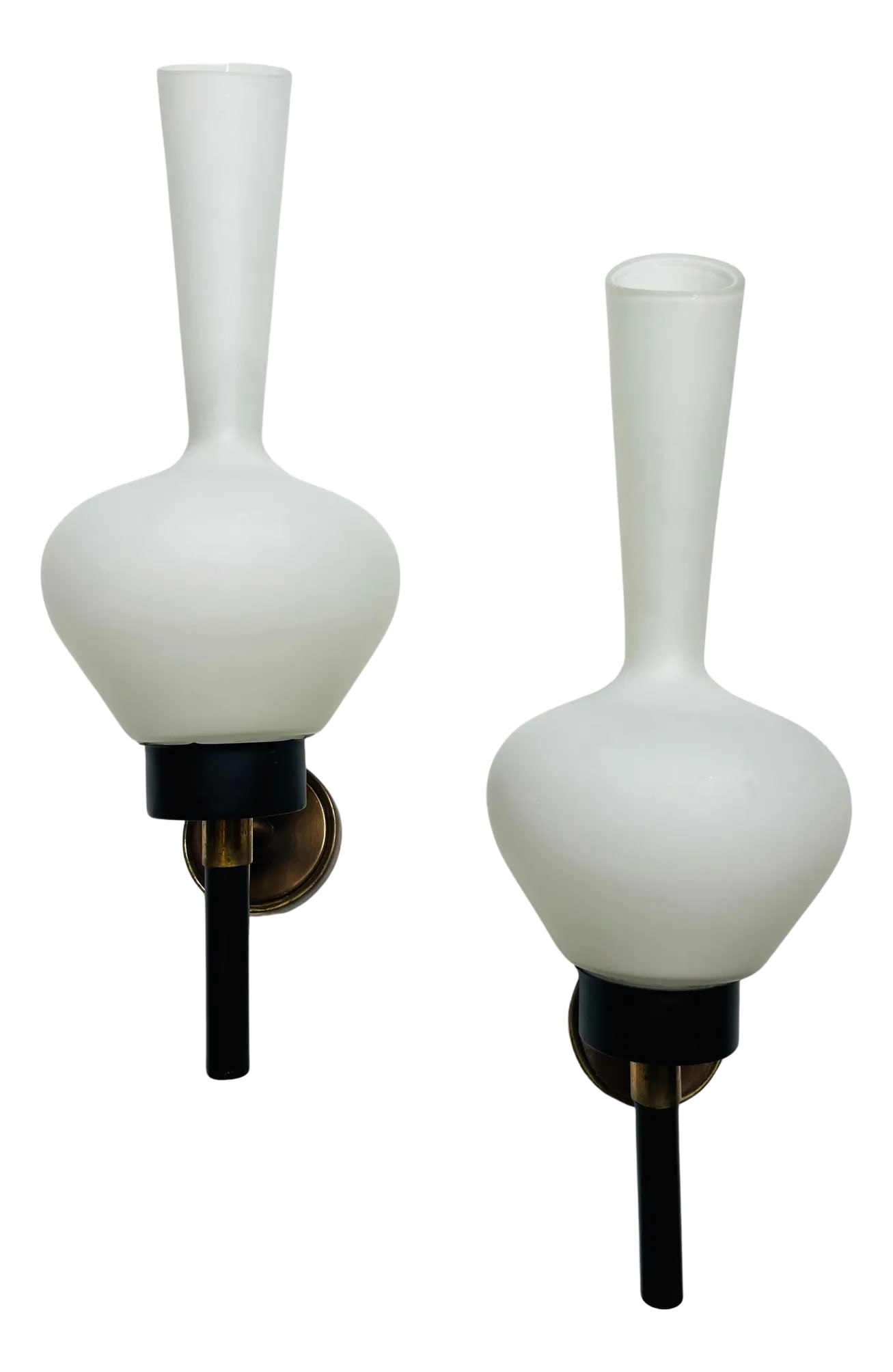 Large Grand Pair of French 1950s Mid Century Wall Lamps: A beautiful large pair of 1950s French wall lights with white elongated glass shades and black enamel and aged brass fixtures. Matching 5" back plates provided. Rewired.Rare.. 7" depth with added