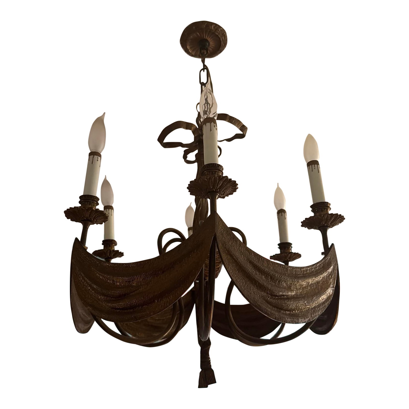 Early 20th Century Continental Bronze Swag Tassel Chandelier: Listing is for an antique brass/bronze 6 light chandelier that is formed by swags with floral bobeches and tassel bottom. The metal is non magnetic. Anout 20.5" across at where the swags connect. In
