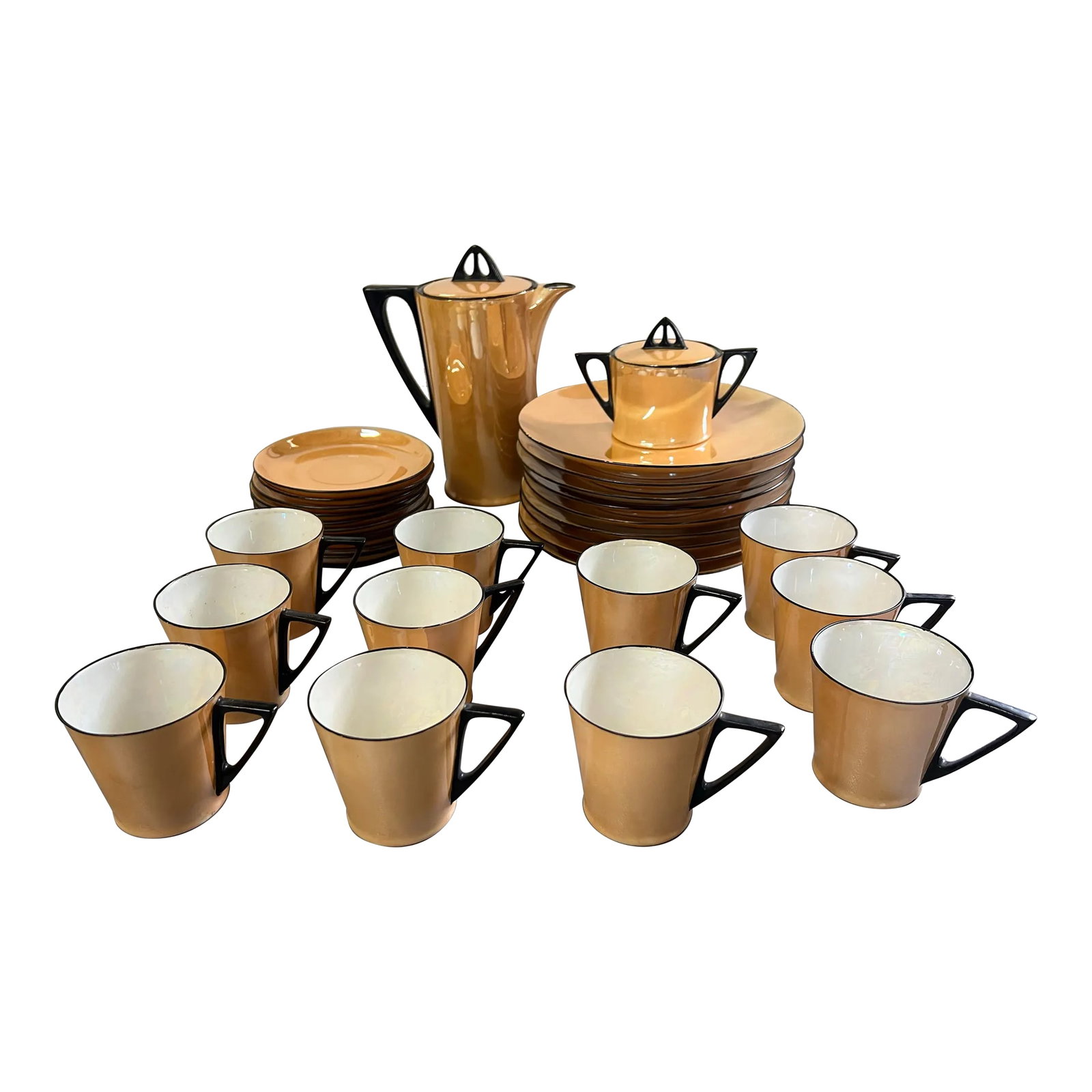 Vintage Art Deco Peach Irridescent Lusterwear Dishes - 32 Pieces: Vintage (1925 - 1939) Art Deco iridescent peach lustreware with black trim dessert set. Chocolate pot / Coffee pot , sugar bowl , tea cups with saucer and some plates. Made by Hutschenreuther Selb fro