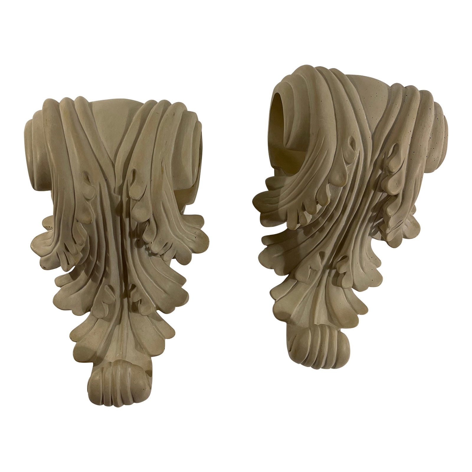 Pair of Late 20th Century Wall Mounted Corbels: Pair of vintage wall mounted corbels with acanthus foliage and scrolled design. Center with holes for securing a drapery or tapestry rod. Condition: Alterations: Original Condition Unaltered