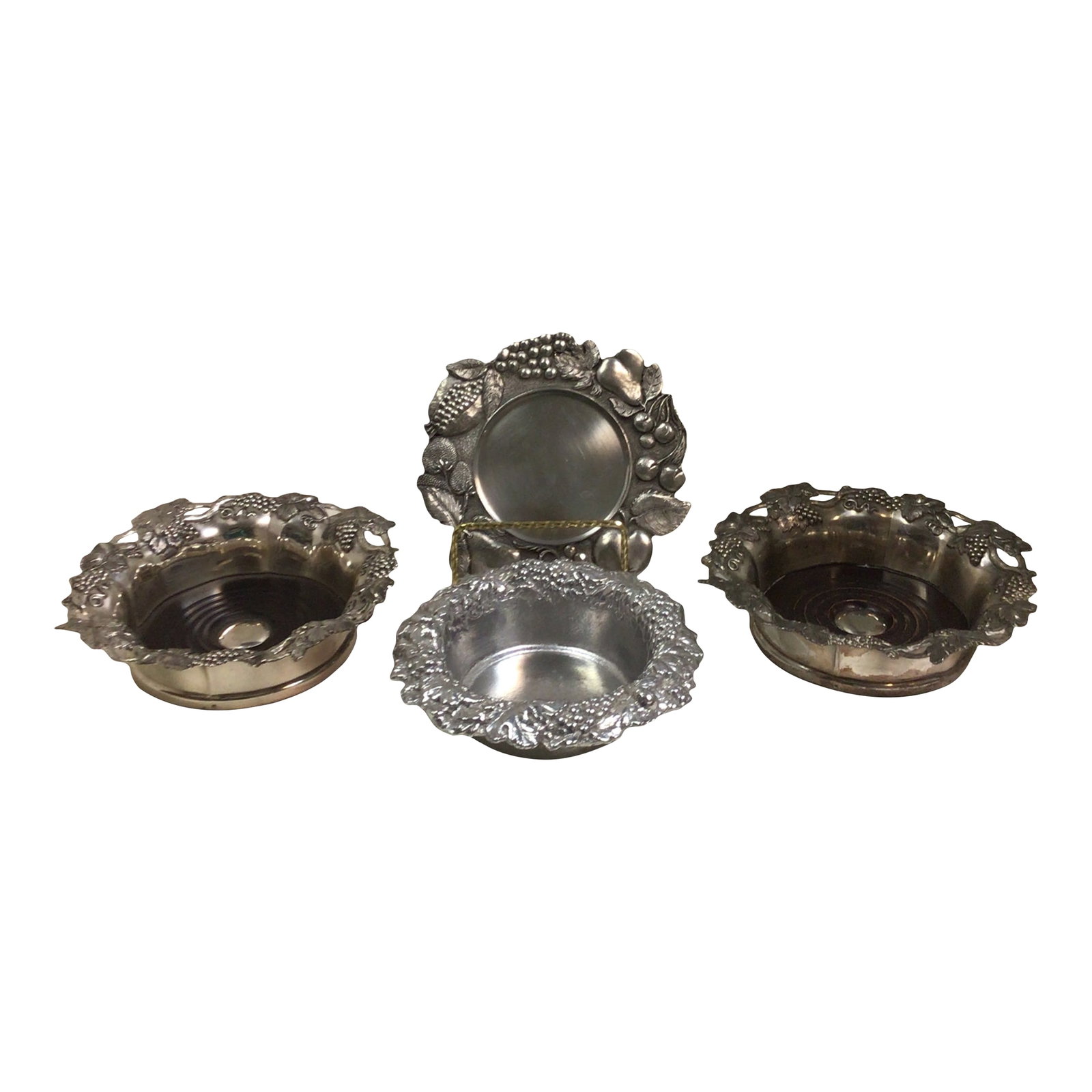 Sheffield Silver Plated Wine Bottle Coasters,1 Italian Pewter Coaster, 1 Author Court Wine Bottle Co: The Artnur Court grape and leaf wine coaster is made of aluminum and the measurements are 6 1/4 inches wide by 2 1/4 inches tall. The Italian William Sonoma Etain Zinn pewter fruit themed wine coaster