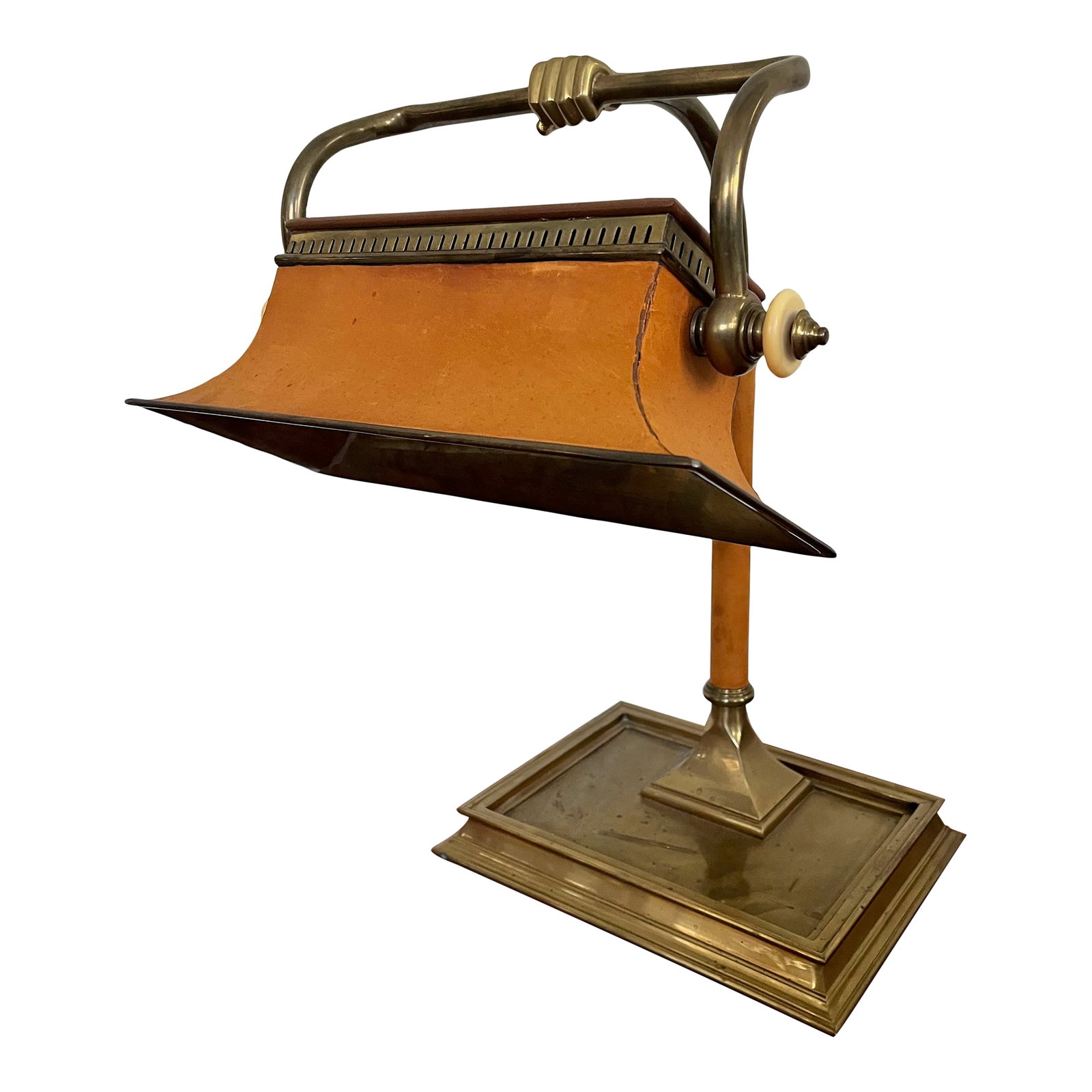 Vintage 1984 Chapman Desk Lamp: Beautiful vintage Chapman desk lamp from 1984. This lamp has stunning patina on the brass and also the warm camel leather has the right amount of age. The lamp does work and takes a 60 watt max bulb. 