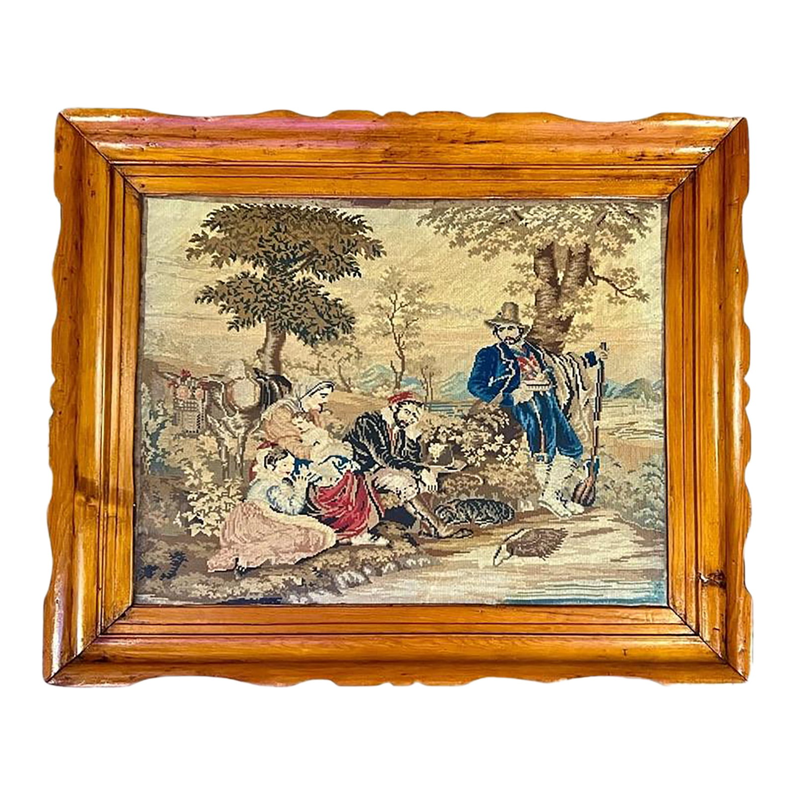 Antique Framed Needlepoint Scene-Hand Carved Pine-Victorian English 1800s-Art: Large antique hand-stitched needlepoint set in a richly hand-carved pine frame, circa late 19th century. The pastoral scene features travelers and a hunter at rest, executed in fine wool on canvas. Ho