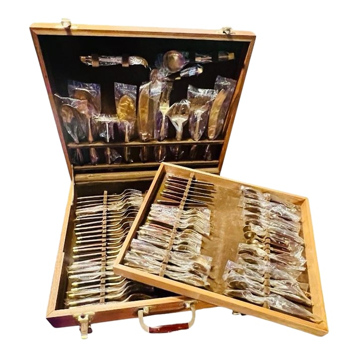 Mid Century Modern Flatware Set in Rosewood & Bronze-Teak Case, Thailand- 100 Pieces: Sophisticated 1960s mid century modern 100-piece flatware set attributed to Jean Claude, crafted in Thailand with warm rosewood handles and satin nickel bronze cutlery. Housed in its original teak