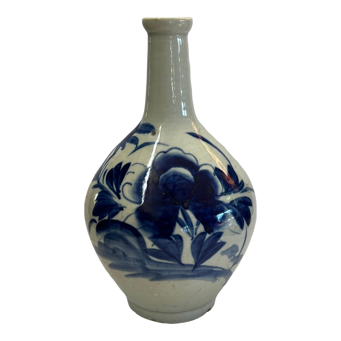 Antique Korean Sake Bottle With Underglaze Blue Flower: I found this Sake Bottle in my last visit to Japan. It is made of porcelain and decorated with a underglaze blue peony flower with leaves and fluttering butterflies. The bulbous body has a long