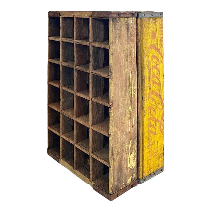 Primitive Wood Soda Crates, a Pair: A pair of wood boxes that were originally used to transport soda bottles of Coca Cola and Pepsi. Made in Mexico and stamped, these two harken to a time long ago, when joinery in the simplest items