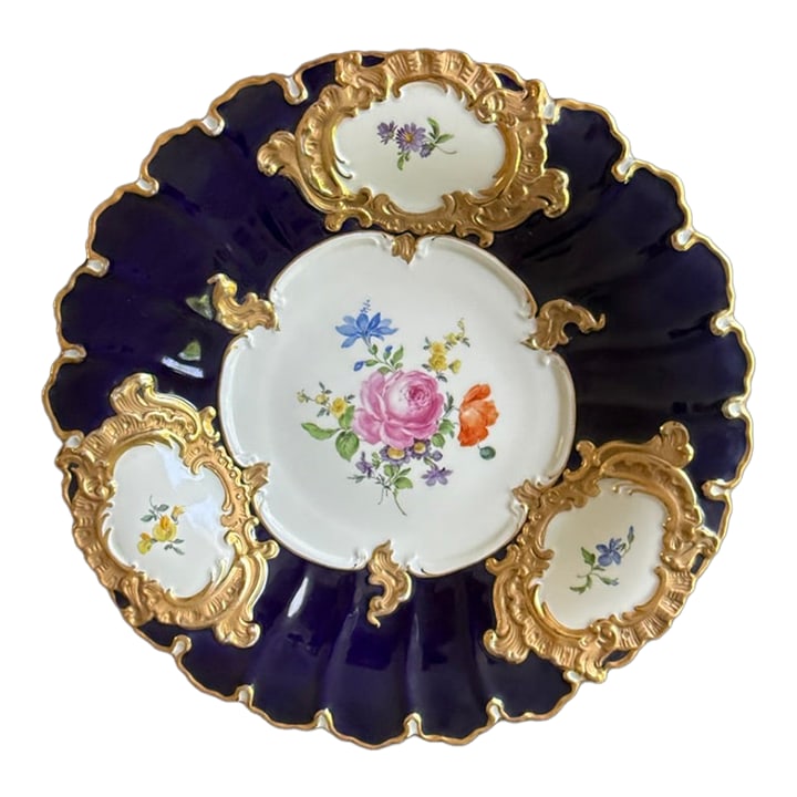 Meissen Cobalt Blue and White With Floral Accents Plate: Stunning deep blue cobalt and white. Floral accents with gold gilt relief. Marked with Meissen sword mark and F152. This is a really nice large display plate / bowl / charger made by Meissen during