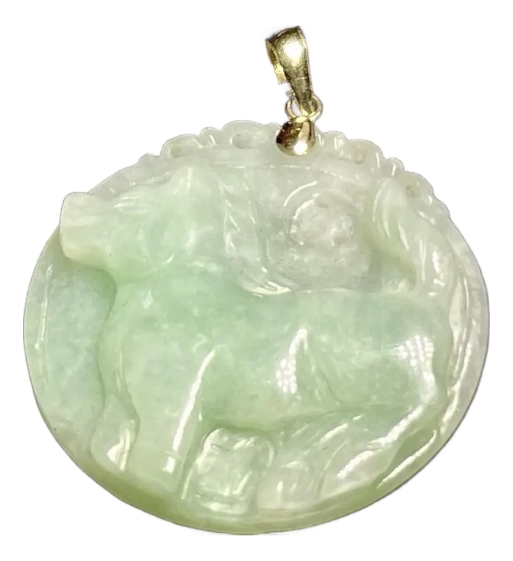 Jadeite Jade in 14k Gold Apple Green Carved Pendant: This jadeite jade apple green 30mm. pendant features a carved horse design, representing one of the twelve animals in the Chinese zodiac. The pendant is of a semi translucent light green jadeite with