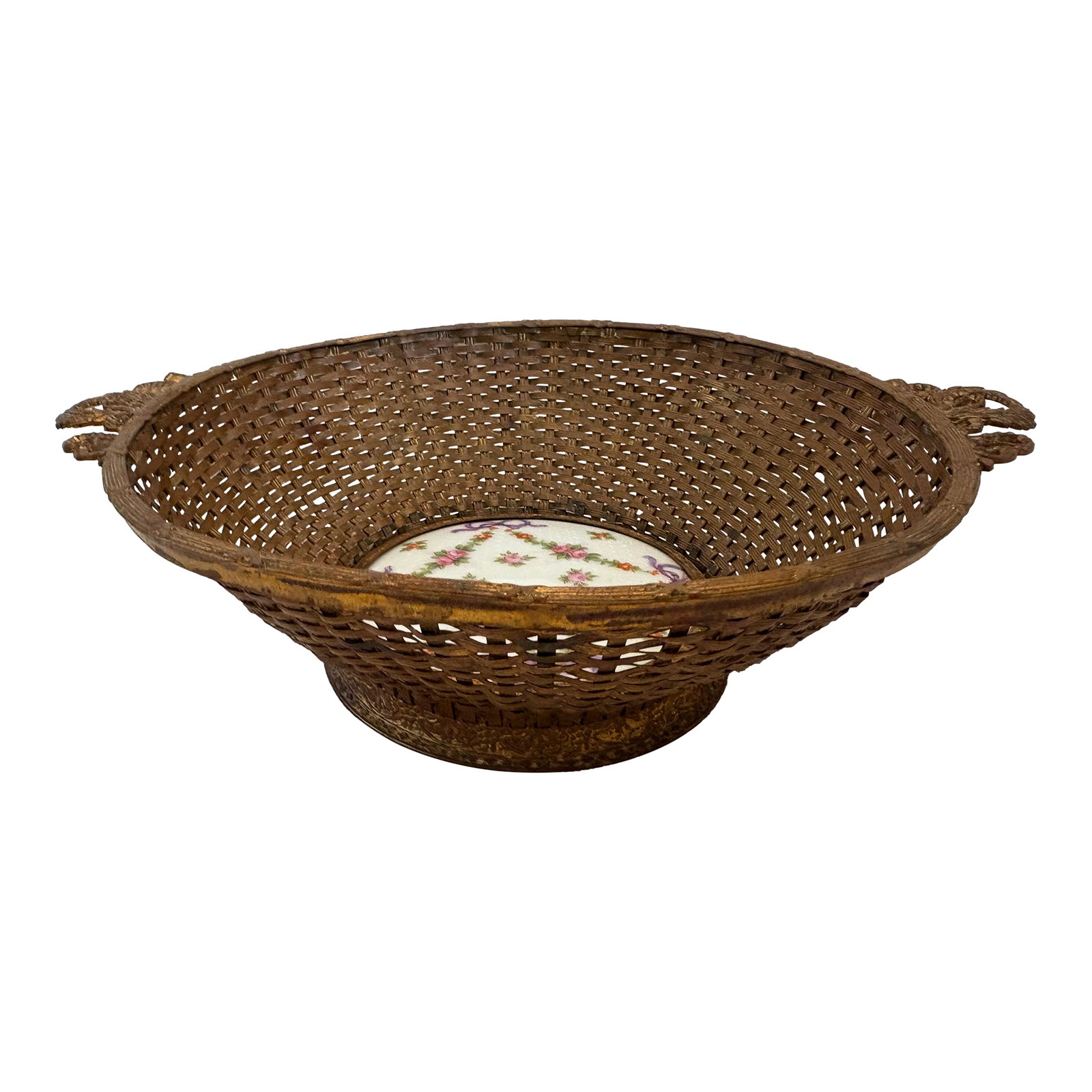 Antique French Dore Bronze Basket With Center Porcelain Plaque: Antique French woven bronze basket with hand painted porcelain plaque center. The piece dates to the early 20th C nThe basket has acanthus wreath handles with loop decorations. The enter plaque is