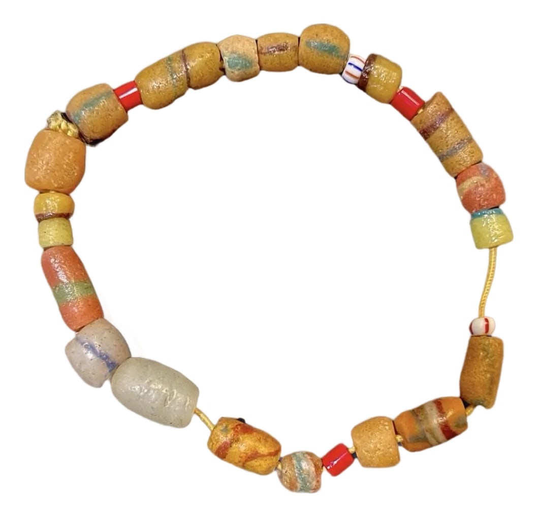 19th Century African Sandcast Glass Bead Bracelet With Trade Beads: This 10" bracelet on stretchable chord features African sandcast glass beads, which were traditionally made by melting glass powder in clay or sand molds, creating the distinctive textured appearance