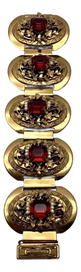 MCM Jewelry Victorian Revival Gold Tone Link Bracelet With Seed Pearls and Synthetic Ruby Very Solid: This Victorian Revival mid century bracelet. The design features intricate gold filigree work, prominent red crystal faux rubies and small seed pearls arranged in a decorative pattern typical of the p