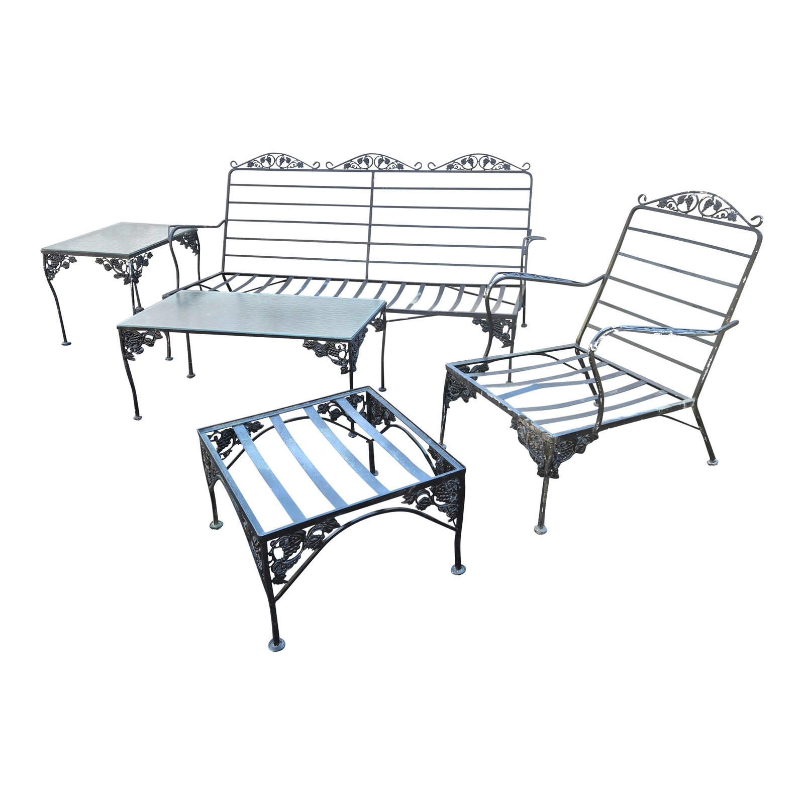 Late 20th Century Wrought Iron Patio Furniture Set, 5 Pieces: Wrought Iron Outdoor Furniture Set 5 Piece Set consisting of: Sofa 72x24x35 Arm Chair 22x22x35 Ottoman 22x22x13 End Table 32x18x18 End Table 24x18x22 Beautiful grape leaf and vine design. Very detaile