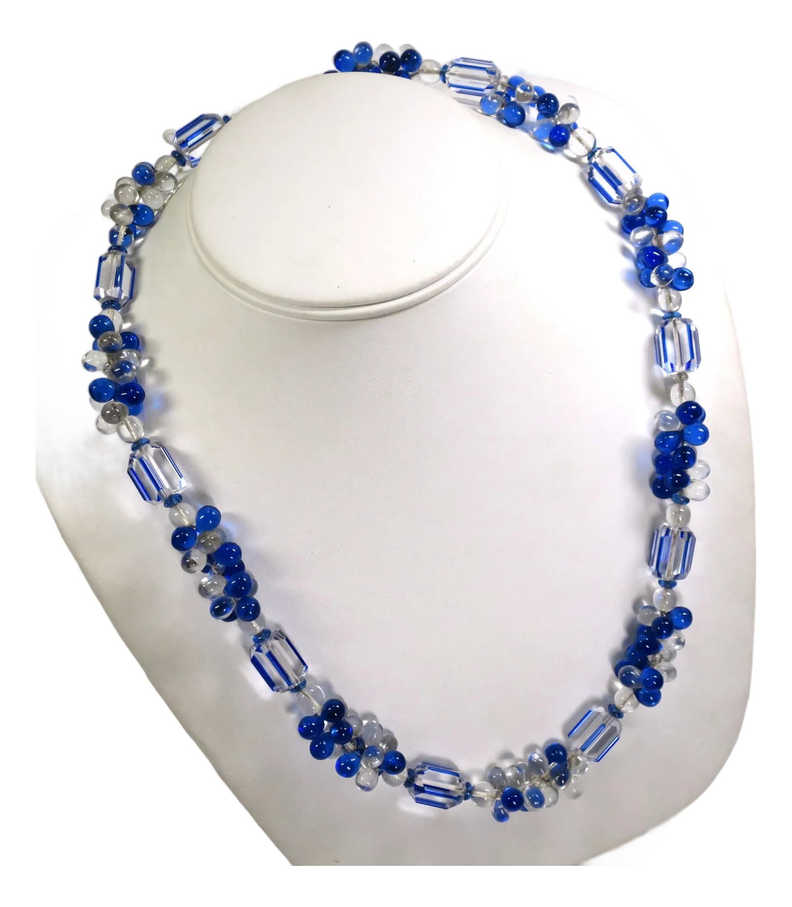 Vintage Art Deco Sapphire Optical Glass Necklace 1930s: Vintage Art Deco beaded optical glass necklace 1930s. Geometric hexagonal beads of clear and sapphire optical glass alternate with clusters of teardrop beads in clear and sapphire hues, separated by