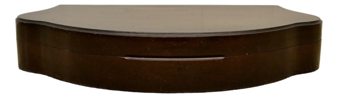 Mid 20th Century Clam Shaped Mahogany Table Box: A large scale tarnish resistant felted silver storage box with a rare and unique shape. Excellent display or storage box. Outer finish shows some signs of age and would benefit from newly fitted inter
