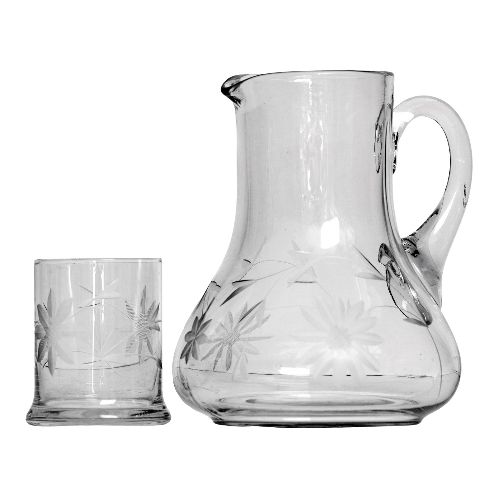Mid 20th Century Night Stand Pitcher & Glass: Cut crystal nightstand pitcher & tumbler/lid. The set is made of mouth-blown glass with a cut floral/leaf design. The tumbler fits into the top of the pitcher to act as a lid. fits into the top of