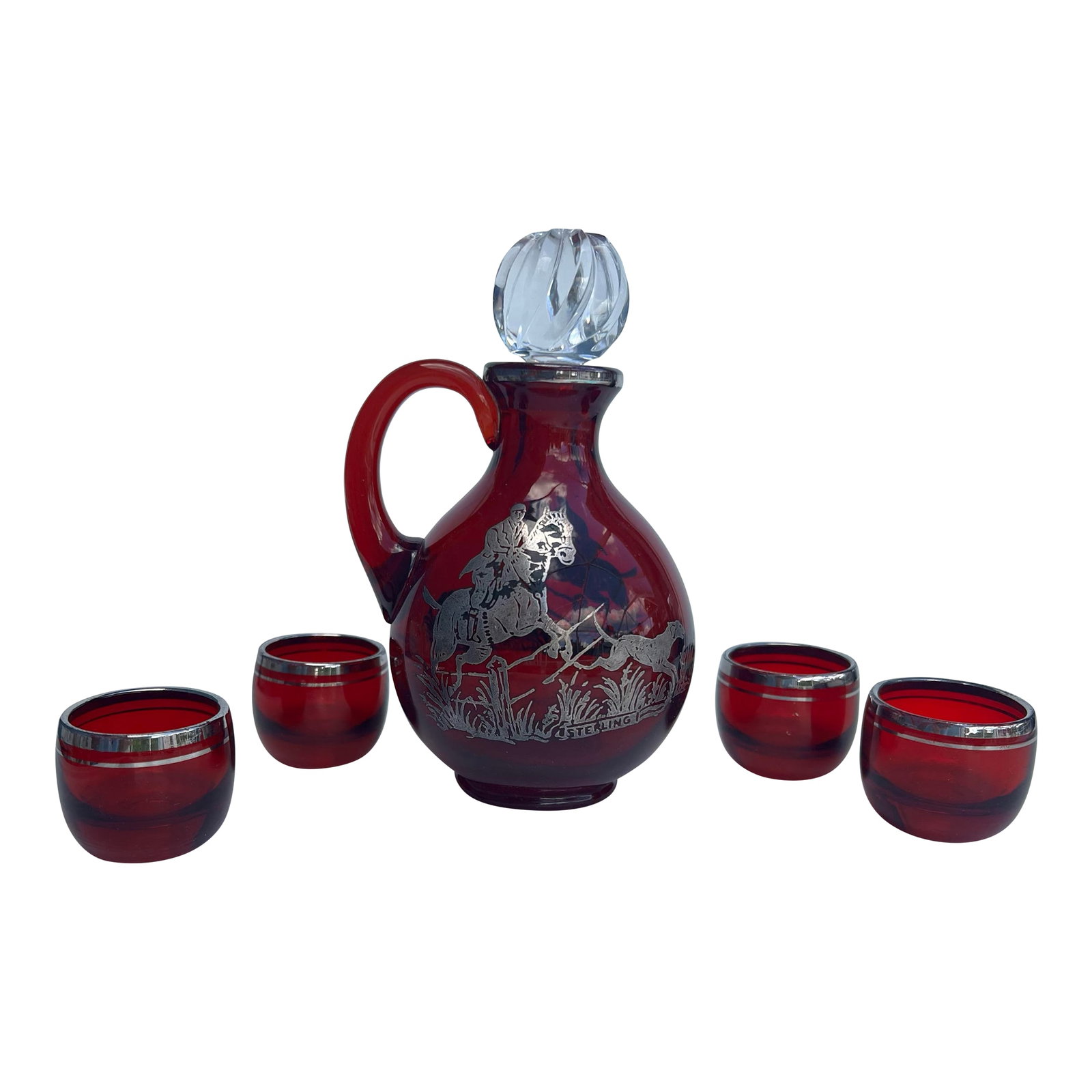 Antique Ruby Red Glass Cordial Decanter & Tumbers Set With Sterling Silver Hunt Scene: Antique vintage ruby red cordial decanter with Tumbler Set This small decanter is used to serve after-dinner liqueurs which typically have intense flavors and a slightly higher alcohol content. These 