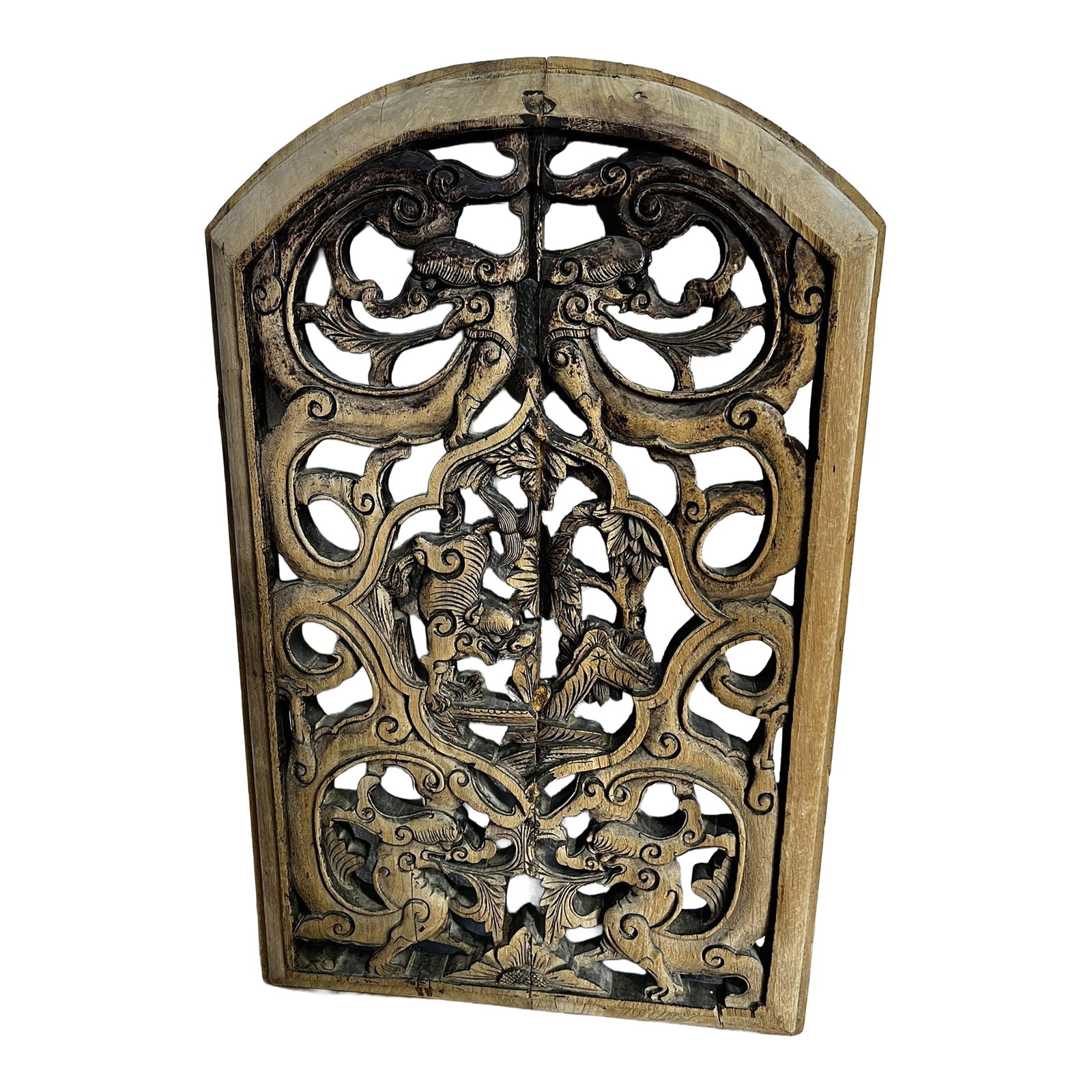 Antique Wood Panel With Carvings of Dragons: Among the outstanding skills of Chinese craftsmen, wood carving has to rank high on the list. Until steel window frames were introduced, most windows in Chinese houses were made of wood. This